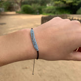 BRACELET LOOM BLEU CIEL AVEC POISSON EN ARGENT