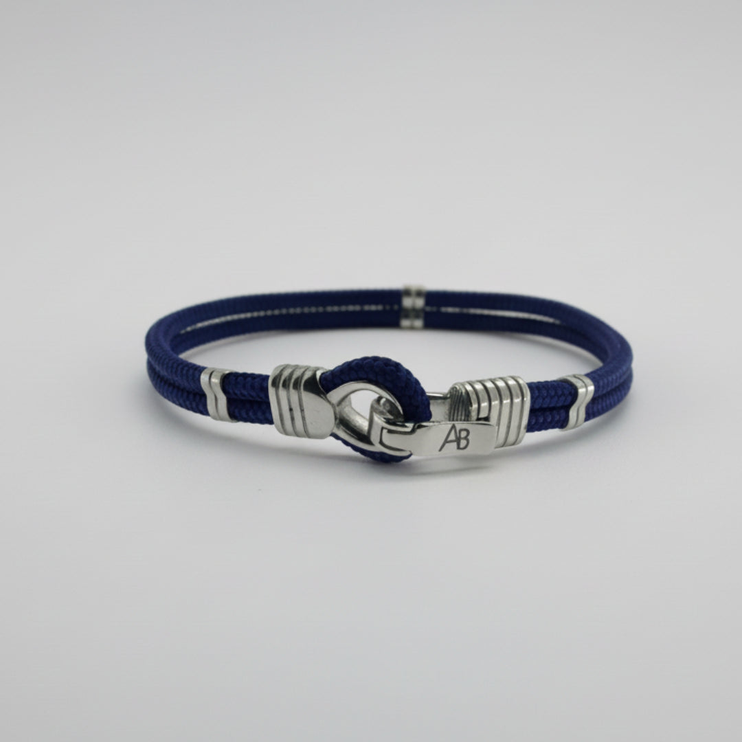 PULSERA CORDÓN AZUL ELÉCTRICO Y PIEZAS DE ACERO