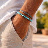 STEEL CHAIN ​​BRACELET WITH TURQUOISE BALLS