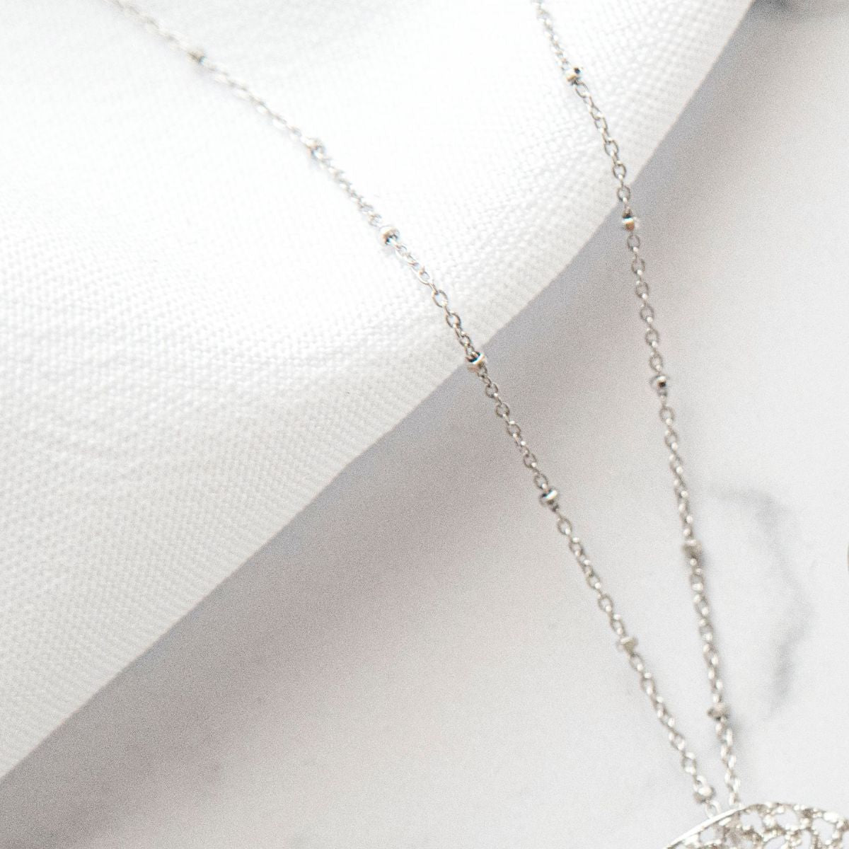 FORCED CHAIN ​​03 RHODIUM-PLATED