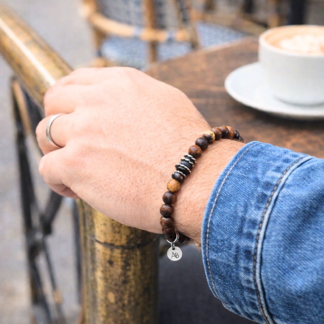 PULSERA DE MADERA Y PIEZAS DE ACERO