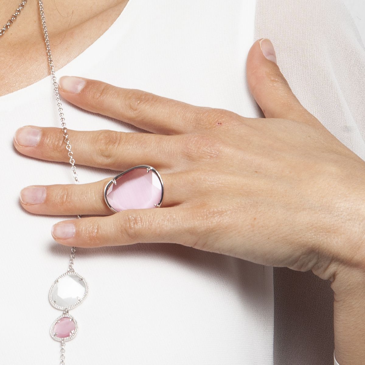 IRREGULAR RING COLORS SILVER AND PINK CRYSTAL